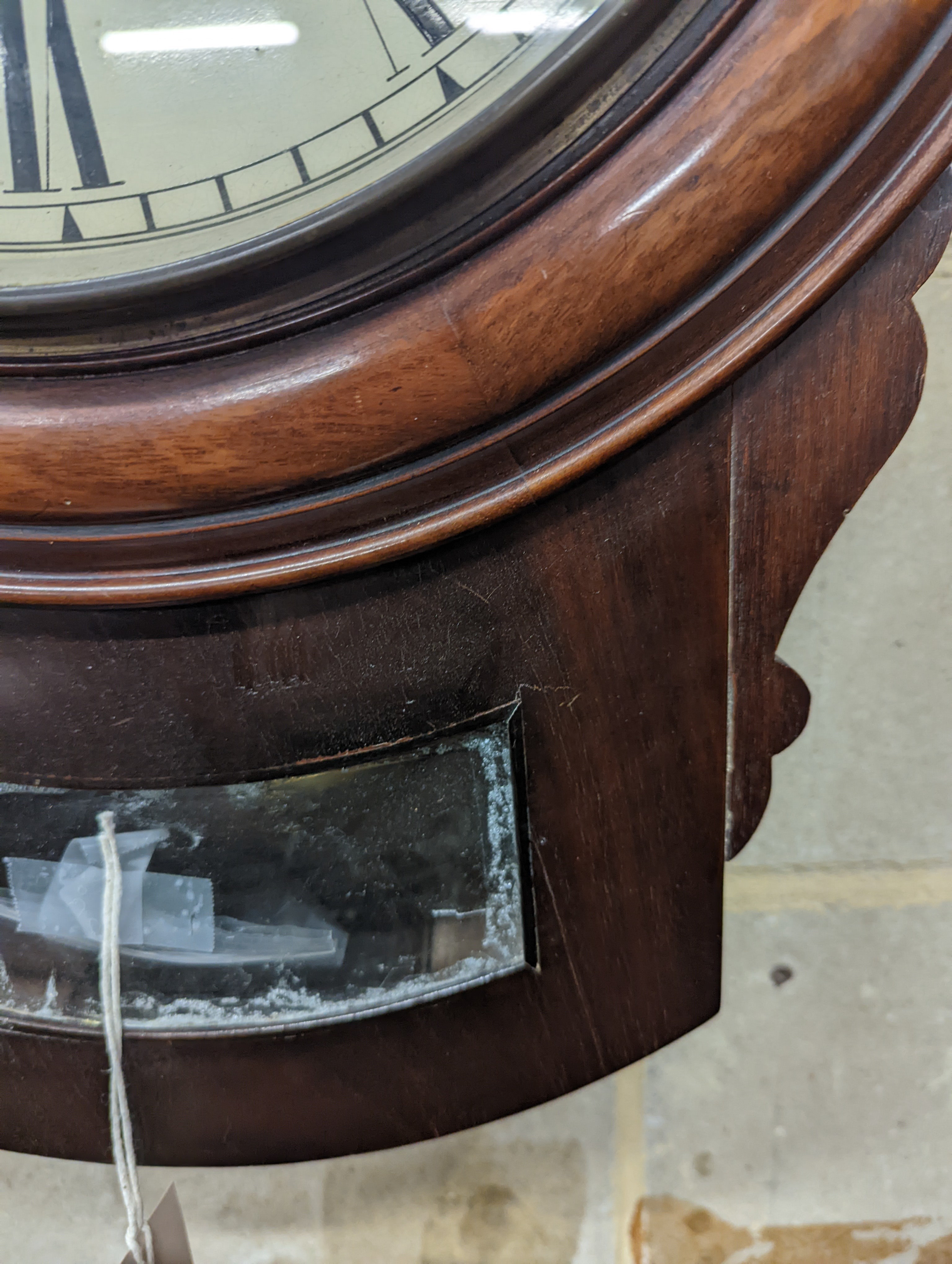 A Victorian mahogany drop dial wall clock, with twin fusee movement, and circular white painted Roman dial signed 